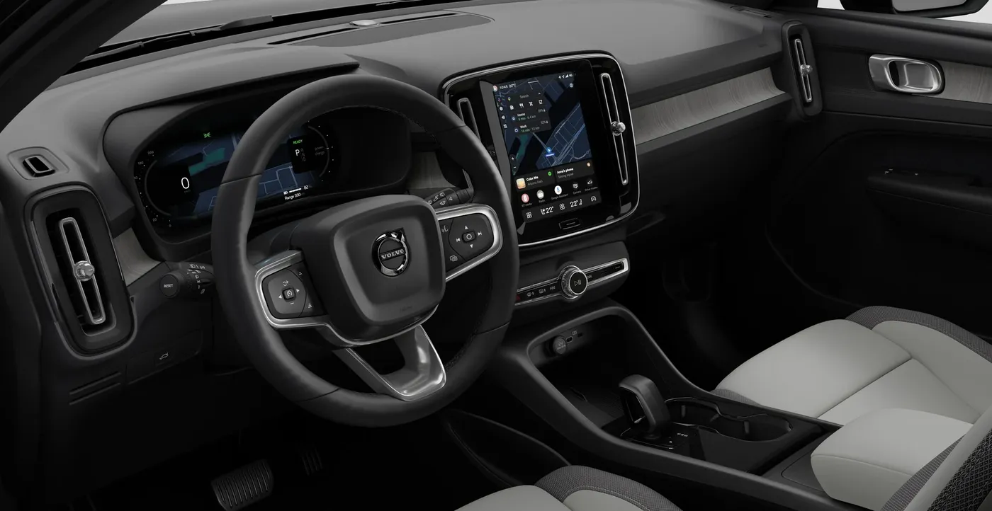 Painel do Volvo EC40 com a tela central